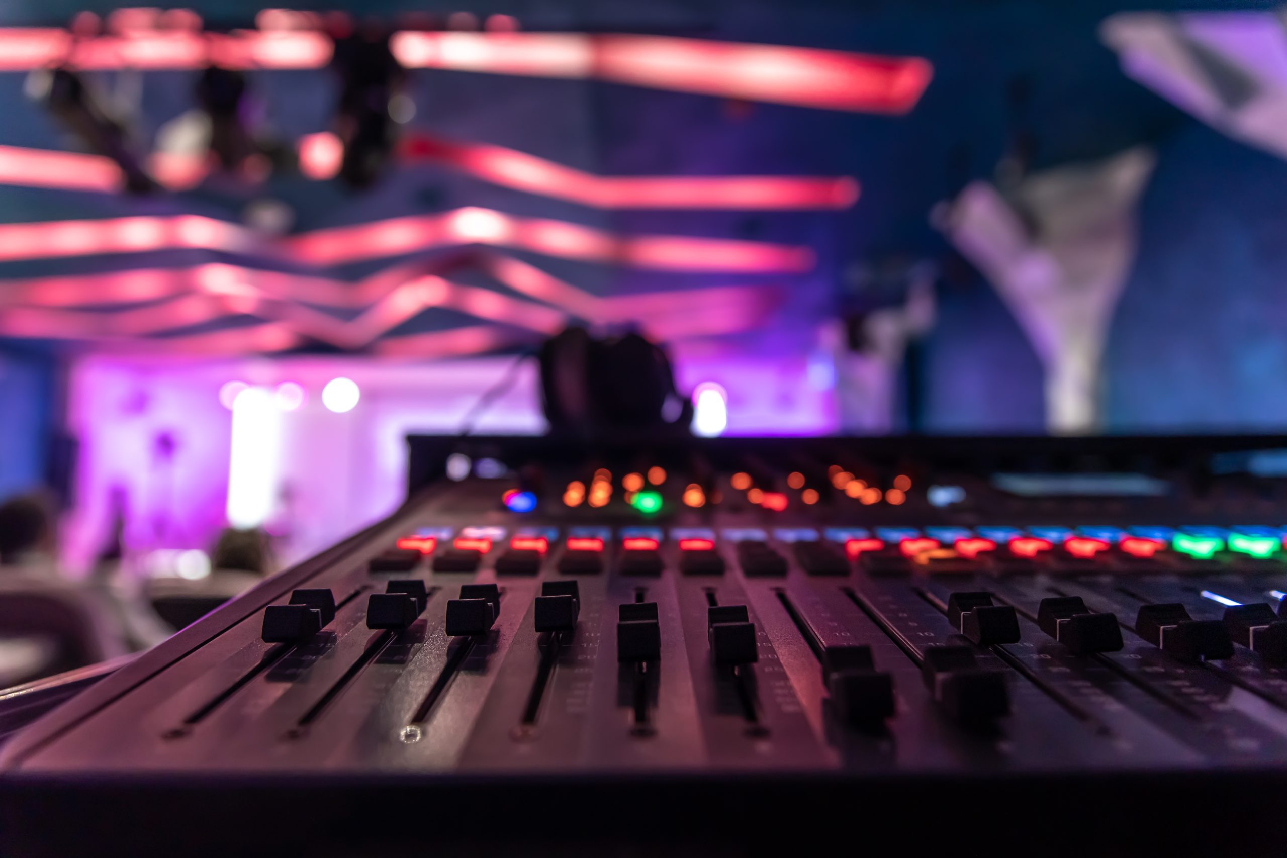 Close up, sound music mixer control panel on blurred background.